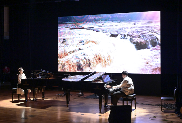 10李音莉与韦一哲演奏《黄河》钢琴协奏曲第三乐章.png 图片